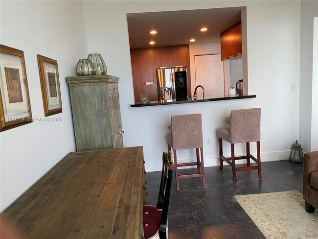 Building Photo - 7901 Hispanola Ave