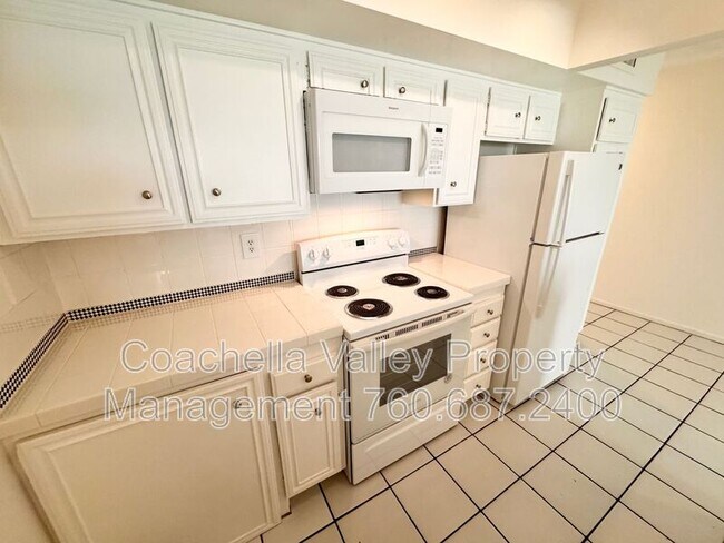 Building Photo - 1655 E Palm Canyon Dr