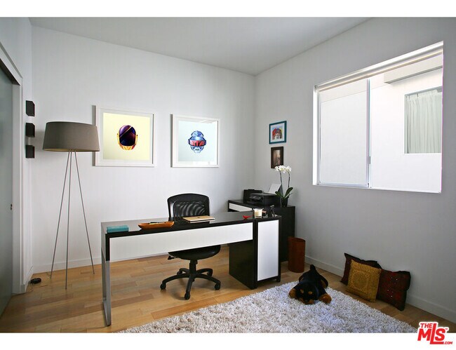 Building Photo - 1211 N Garbo Ln