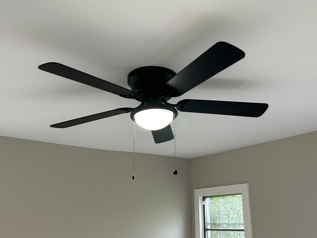 There are new ceiling fans in all bedrooms and living room. - 2245 E Overton Rd