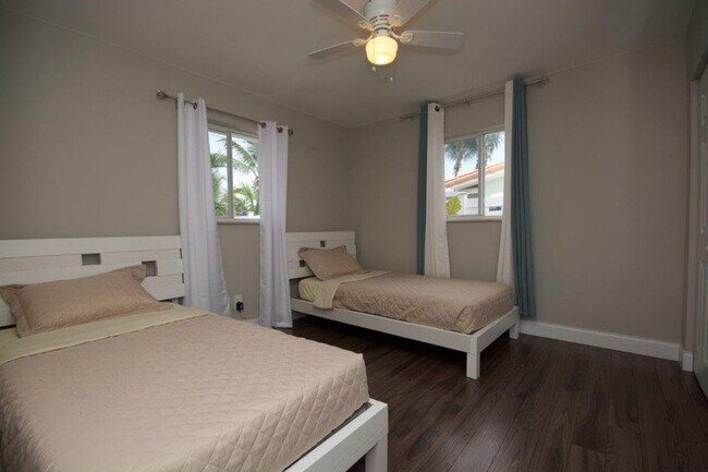 Building Photo - Step Into Sunshine: Modern Charm Meets Coa...