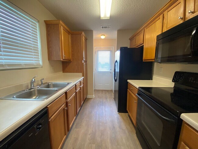 Building Photo - PRE-LEASING FOR AUGUST 2025!  1/2 OFF SECU...