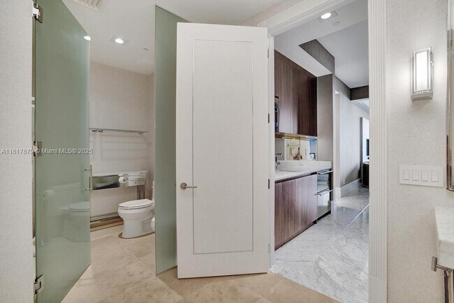 Building Photo - 9705 Collins Ave
