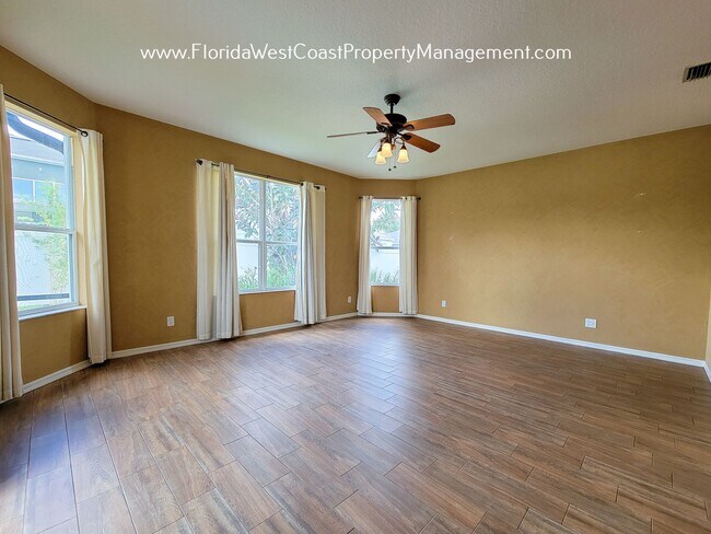 Building Photo - LARGE PARRISH POOL HOME! FENCED YARD! PET FRIENDLY! AVAILABLE FOR JUNE! LONG TERM LEASE!