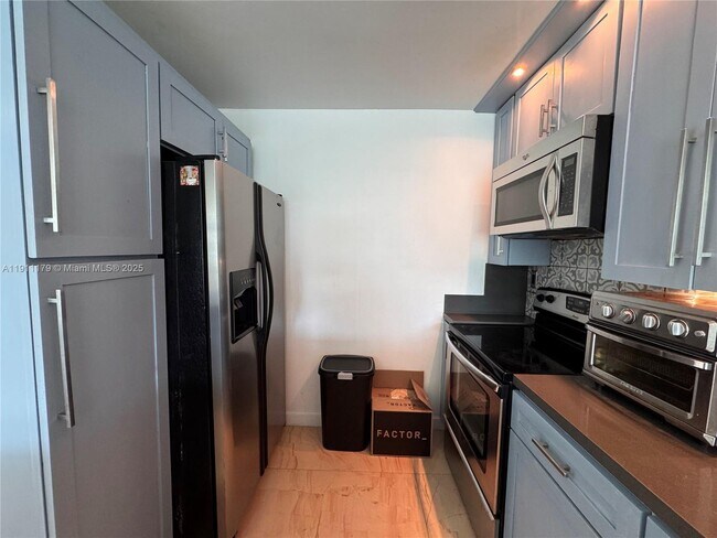 Building Photo - 8233 Harding Ave