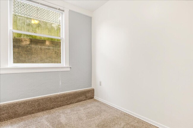 Building Photo - Spacious, Charming Victorian Style Tri-Ple...