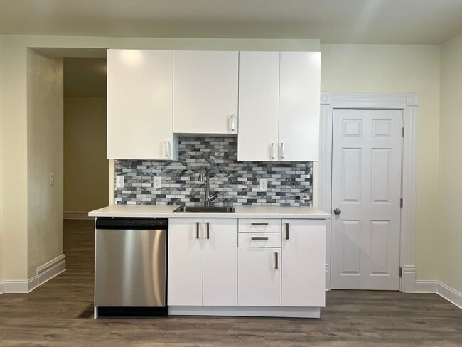 Building Photo - Updated 1BR Apartment Now Available