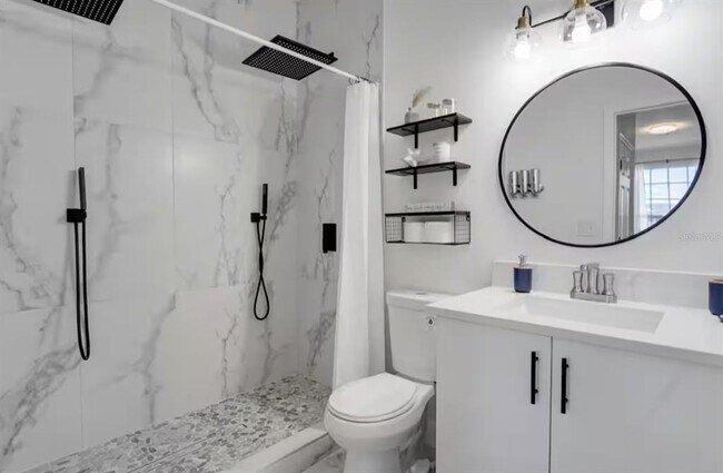 Building Photo - 8103 Coconut Palm Way