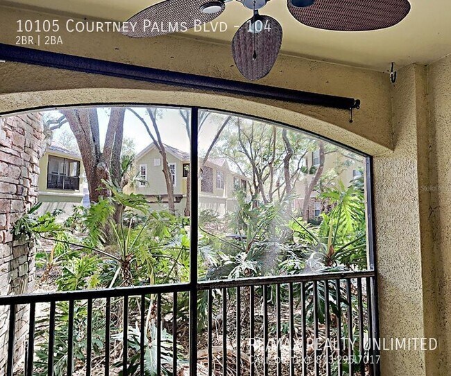 Building Photo - 10105 Courtney Palms Blvd