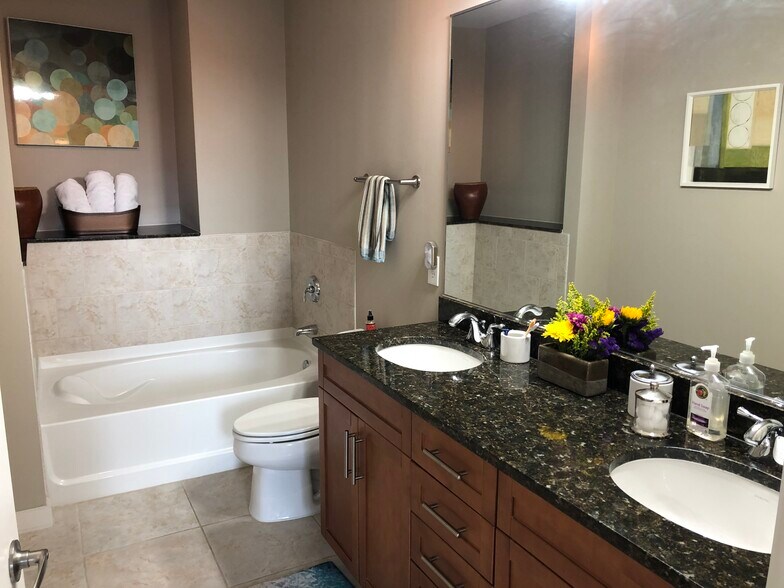 Master Bath - shower, separate tub and dual vanities - 855 Peachtree St NE
