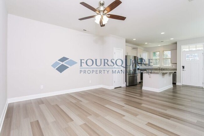 Building Photo - Stylish End-Unit Townhome with Open Floor Plan, Modern Kitchen & 1-Car Garage – Wendell, NC