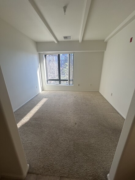 Primary Bedroom - view from primary bath - 180 Cook St