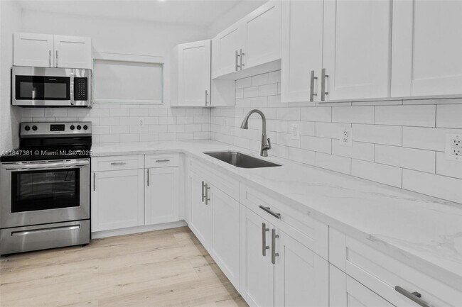 Building Photo - 18401 NW 42nd Ct