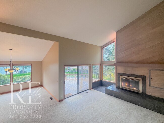Building Photo - Vaulted 2-Bed Home with Scenic Views, Gas Fireplace & Oversized Deck