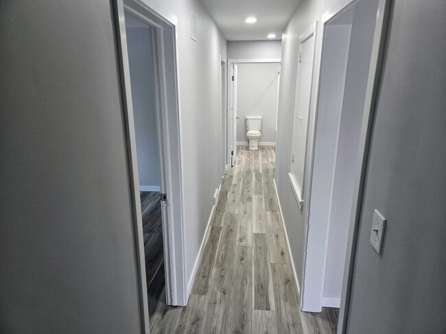 Main Level Hallway + Full Bath - 151 Lilac Dr