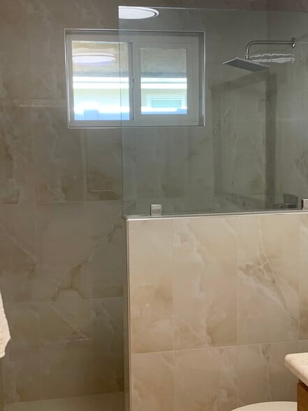 NEW WALK IN SHOWER SECOND BATHROOM - 8322 Mango Ave