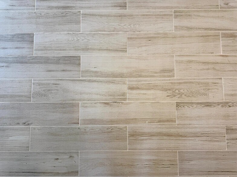 New, stylish, porcelain-tile floor throughout the whole apartment. - 20 School Ave
