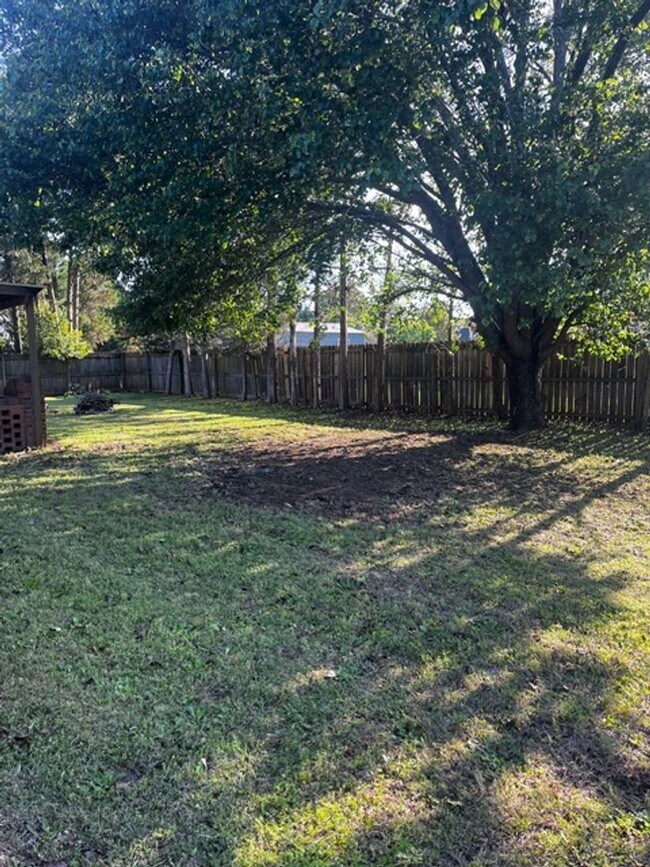 Building Photo - Charming All-Brick Corner Lot Home with Hot Tub & Fenced Yard