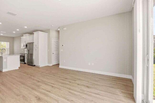 Building Photo - Brand New 4-Bedroom Gem with 2 Full Baths on Large Lot in Lehigh Acres – A Perfect Family Haven!