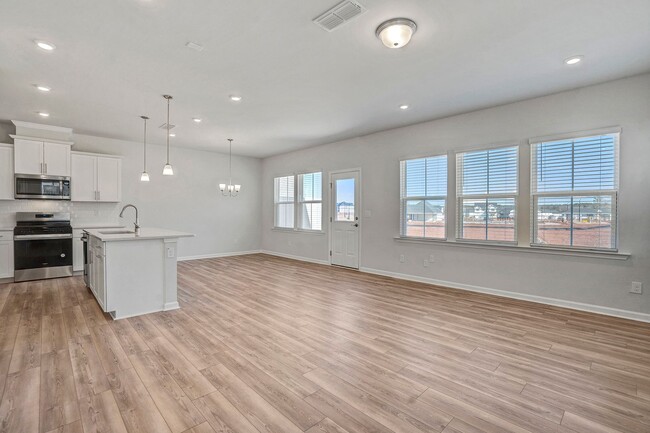 Building Photo - Welcome to this BRAND NEW TOWNHOME- Close ...