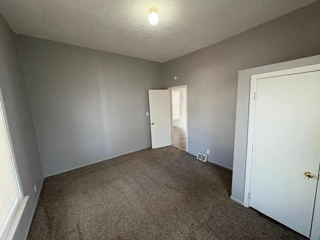 Building Photo - Lovely & Spacious 4-Bedroom Single-Family Home with Open Backyard