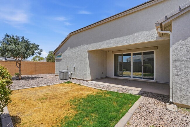 Building Photo - Spacious 5-Bedroom Home with Open Floor Plan & Private Backyard