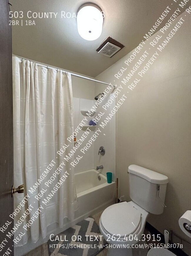 Building Photo - 2 Bedroom Upper Apartment @ Creekside Apar...