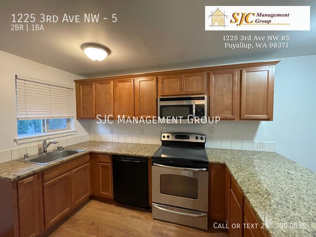 Building Photo - 1225 3rd Ave NW