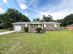 Building Photo - 7724 Rustling Pines Dr