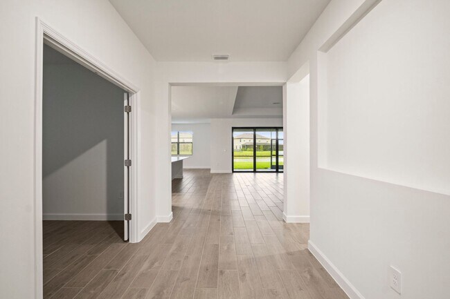 Building Photo - NEW CONSTRUCTION 3beds+Den 3 baths located...