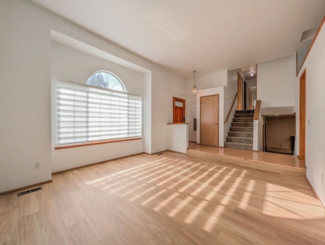 Building Photo - Tri-Level Home w/ Bonus Room, 2-Car Garage & Fenced Yard!