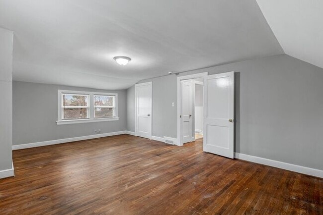 Building Photo - Brick home, Two Story, Hardwoods, DR, 2 Sun Rooms, FP, Carport!.