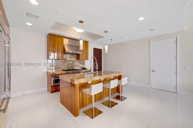 Building Photo - 9701 Collins Ave