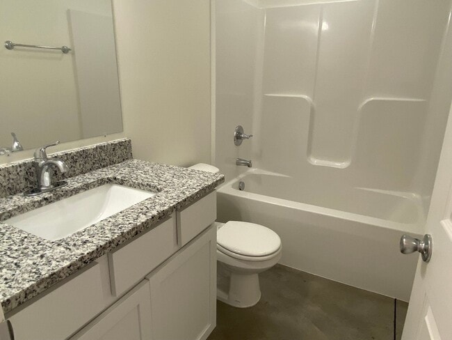 Building Photo - 3 Bedroom 2 bath Duple with Garage - Close...