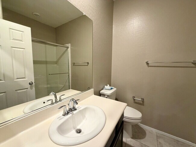 Building Photo - 3 BED 3 BATH 2 CAR GARAGE TOWNHOUSE W/ PRIVATE YARD, LOFT & BEDROOM DOWNSTAIRS IN GATED COMMUNITY...