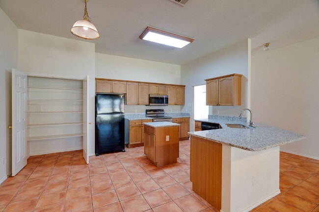 Building Photo - "Beautiful Single-Story Featuring an Office, Open-Concept Design, Dual Living Areas and a Large O...