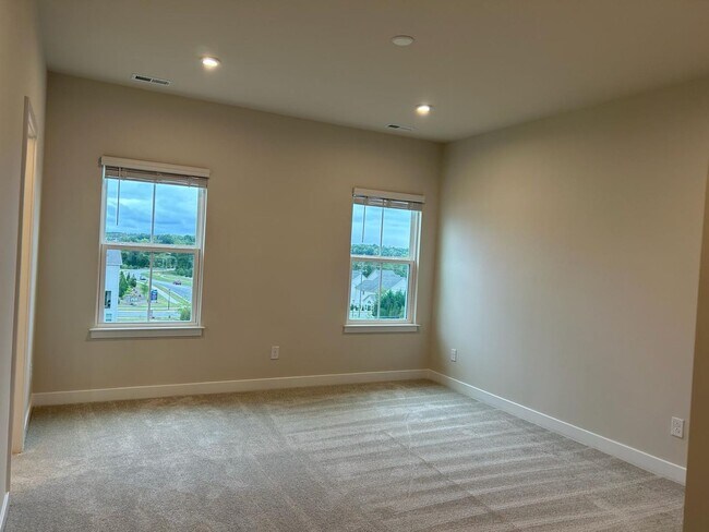 Building Photo - Three-Story Townhome