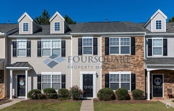 Building Photo - Townhome | Fenced-In Patio | Ceiling Fans|...