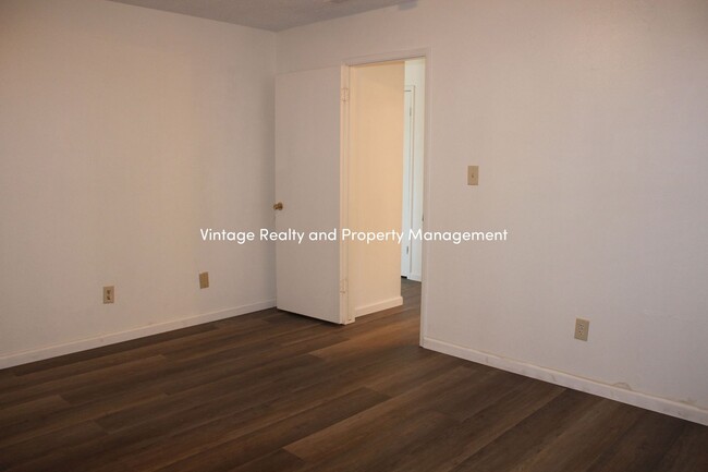 Building Photo - Back On the Rental Market 2 Bedroom Tri-Pl...