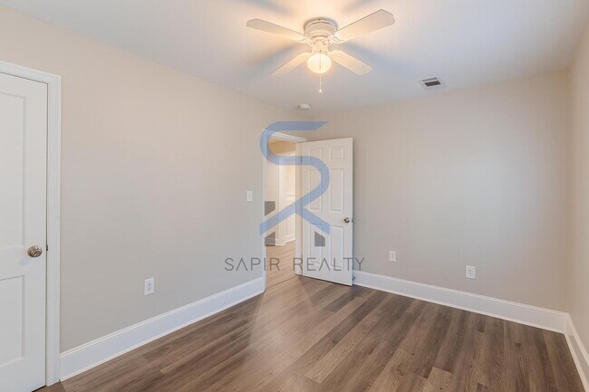 Building Photo - Move in before January 15th and choose your reward: a $250 Amazon Gift Card or a 55" Smart TV!