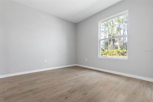 Building Photo - Brand New Townhome Overlooking the 15th Fairway