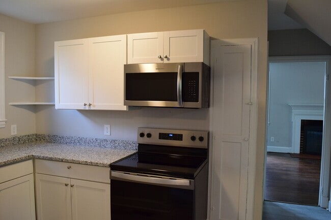 Building Photo - Charming Northside Two-Story Brick Home With 2 car garage and basement