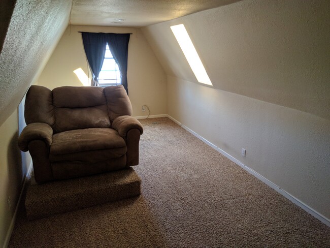 2nd floor 4th bedroom/2nd living space with large closet and skylight - 8716 E 47th Pl