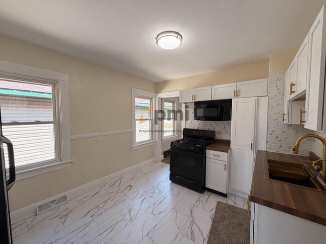 Building Photo - 6244 Madison Ave