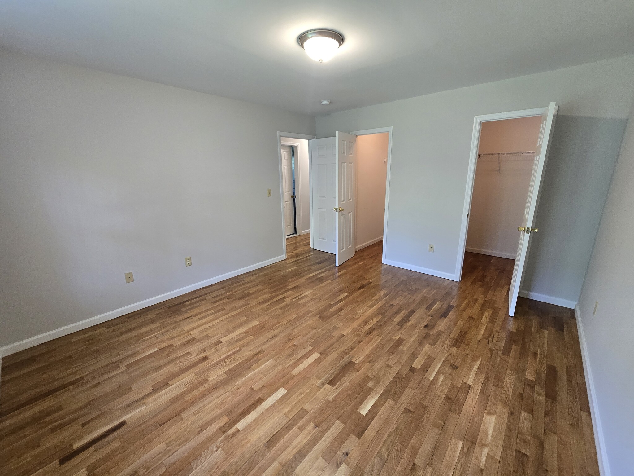 Primary Bedroom with 2 walk in closets - 13 Autumn Leaf Ct