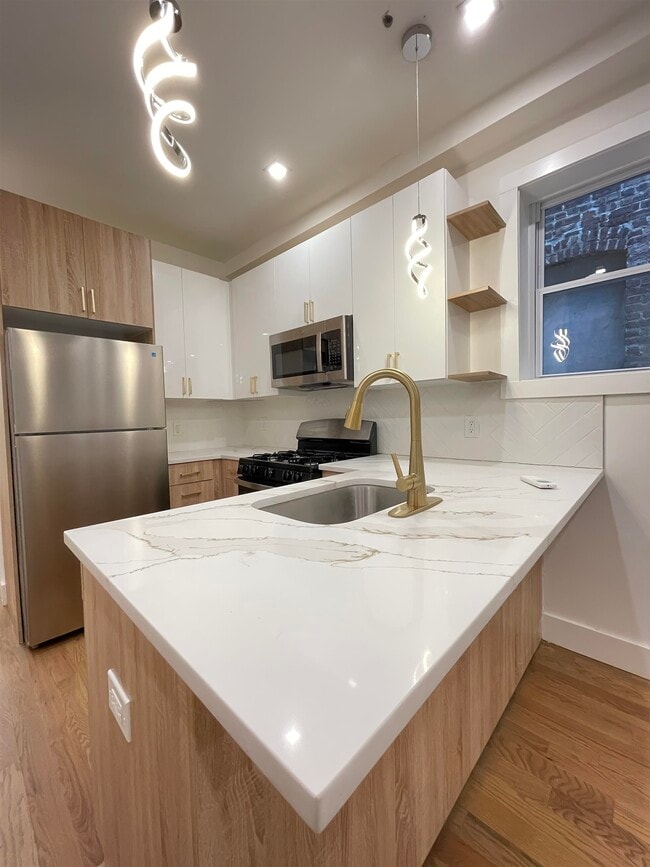 Building Photo - 232 Van Horne St