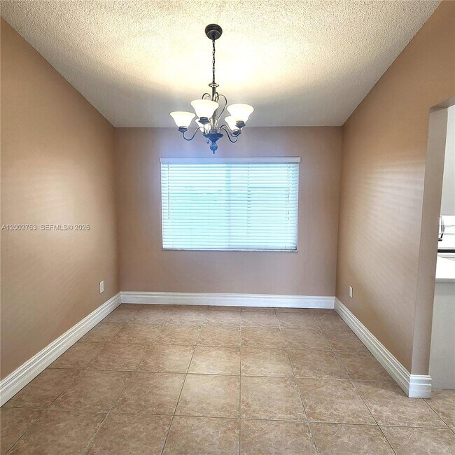 Building Photo - 11950 SW 49th Ct