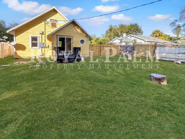 Building Photo - Deck the halls or the French doors, because this charming century-old single family home is avail...