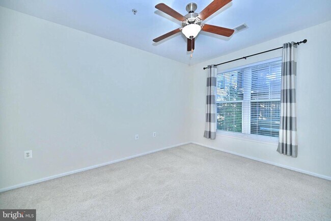 Building Photo - This impeccable 2-bedroom, 2-full bathroom condo is located in the sought-after, super-convenient...