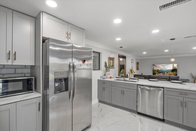 Building Photo - 3-Bedroom Punta Gorda Retreat with Marble Finishes & Stylish Furnishings!"